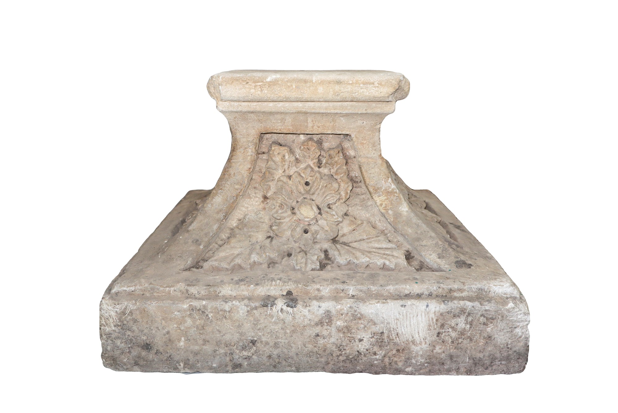 White stone plinth with flower decorations on the sides, XVIII century