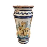 White background vase with blue motifs, flowers and houses, nineteenth century