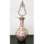 Chinese lamp in shades of white, gold and red with butterflies
