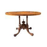 Oval table in walnut briar, nineteenth century