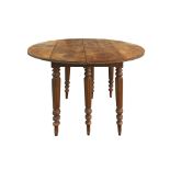 Round table in walnut wood with folding flaps, nineteenth century
