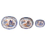 Triptych of serving plates with depictions of oriental landscapes, nineteenth century