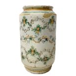 Large Caltagirone cylinder with polychrome floral decoration with thin manganese line on a light bac