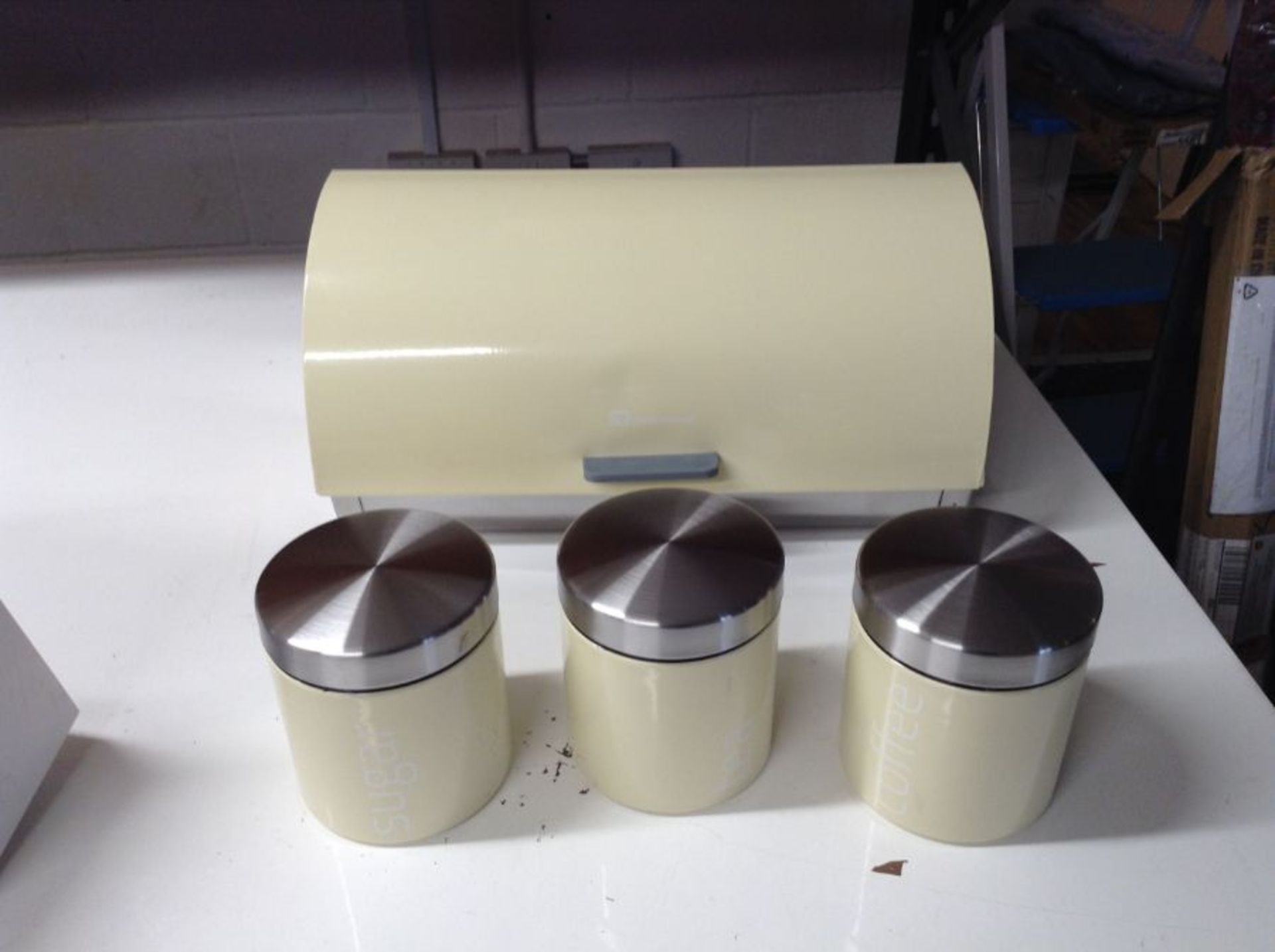 DAINTY BREADBIN AND CANISTERS (SMALL DENT ON BREADBIN CREAM AND STAINLESS STEEL)(~25523/39)