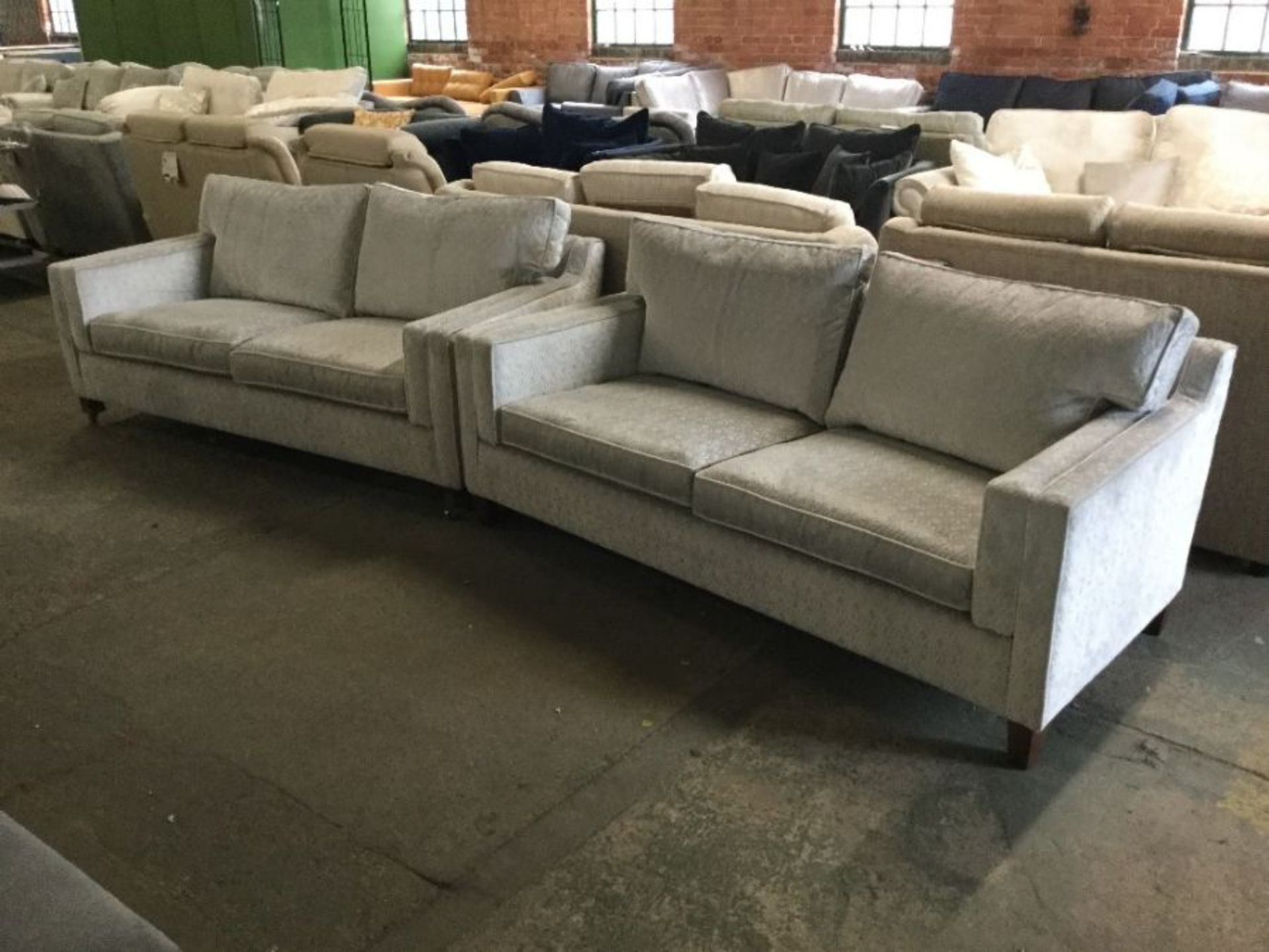 SILVER PATTERNED 2 X LARGE SOFAS (MISMATCHED FEET)