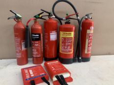 Various Fire Extinguishers And Blankets