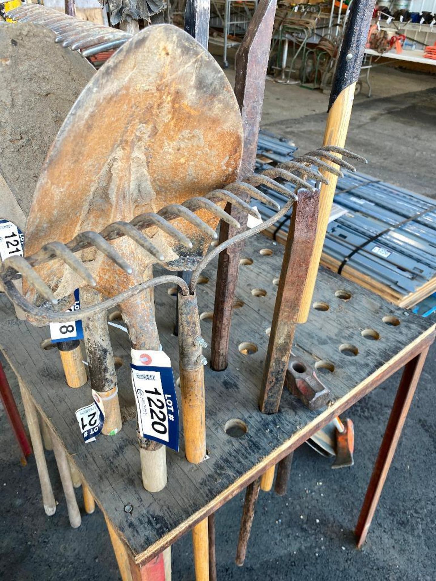 Lot of (1) Shovels, (1) Crowbar, (1) Rake, (1) Hammer