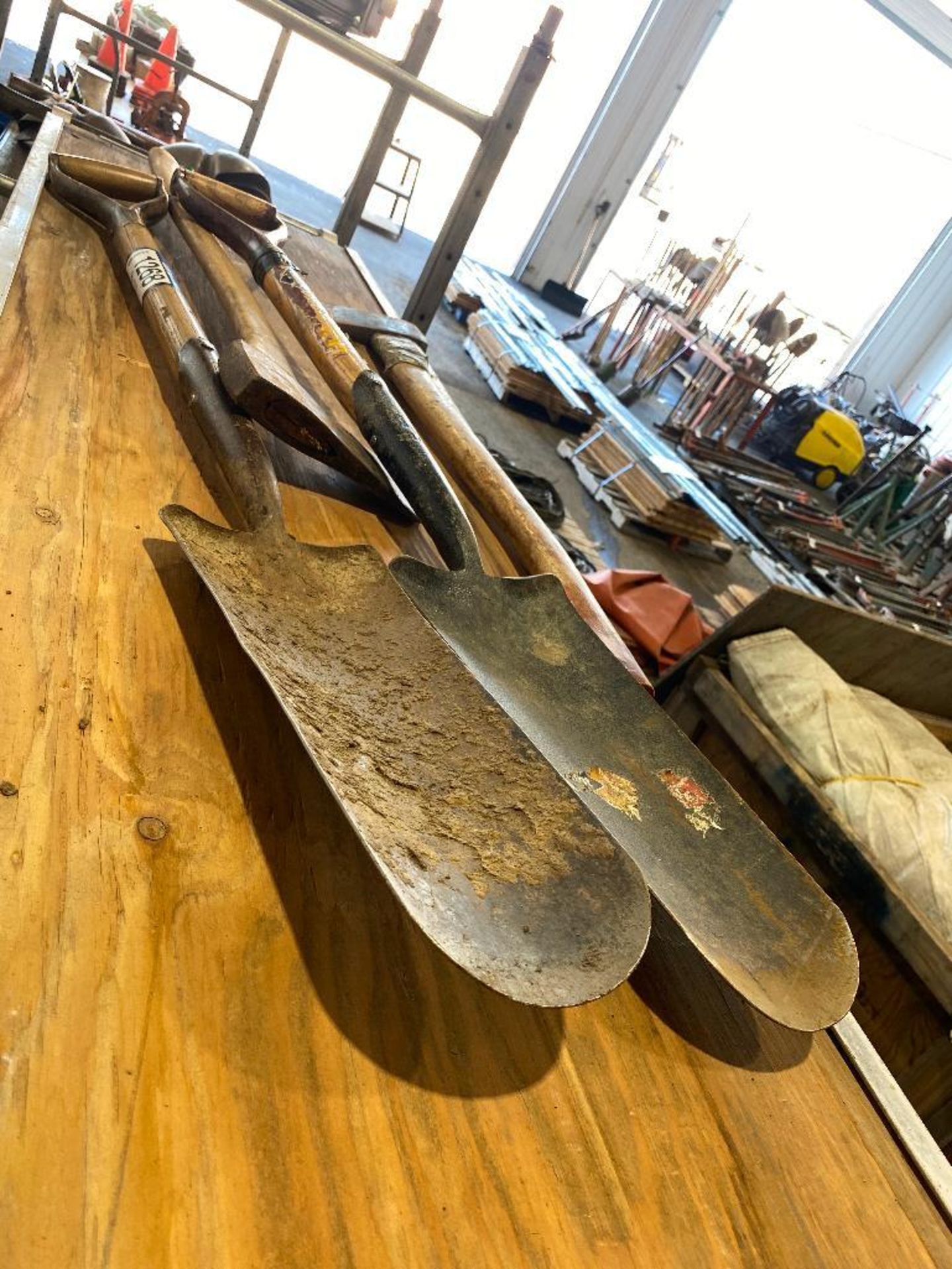 Lot of (2) Axes, and (2) Track Shovels