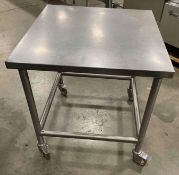 31" X 31" STAINLESS STEEL TABLE ON CASTORS