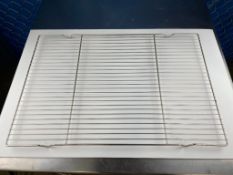 LOT OF (3) FOOTED FULL SIZE COOLING RACKS