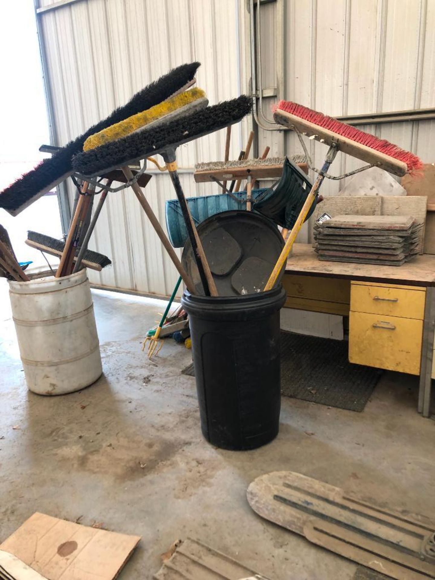 Waste Bin w/ Shovels and Brooms.