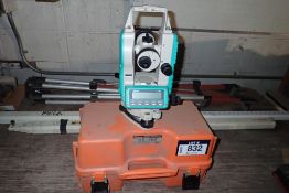 Lot of Nikkon NE100 Digital Theodolite, Hilti Tri-pod and (2) Transit Sticks.