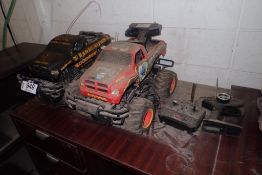 Lot of 2 Dodge RC Trucks and Remotes- NOTE: CONDITION UNKNOWN.
