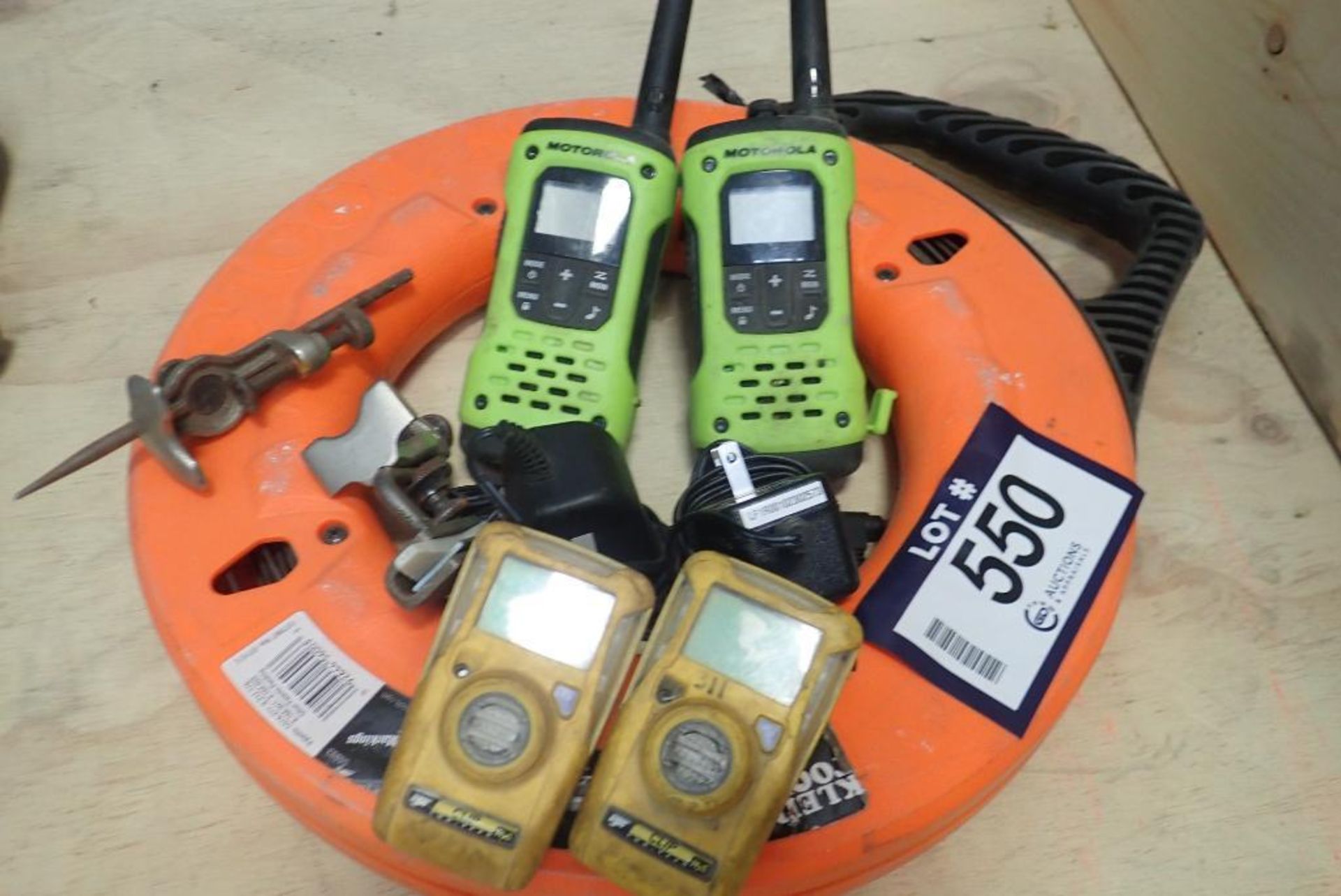 Lot of Fish Tape, (2) Motorola 2-Way Radios, (2) Radius Markers and (2) BW BWC2-H Gas Monitors.