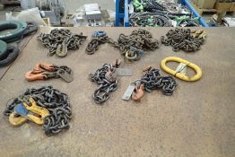 Lot of (7) Asst. Chains and Chain Lifting Slings.