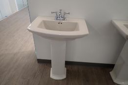 Mansfield Pedestal Sink w/ Delta Faucet.