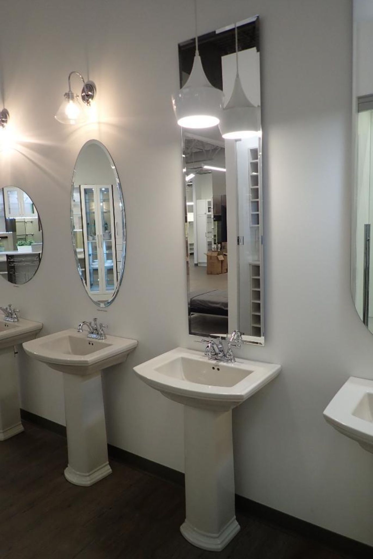Mansfield Pedestal Sink w/ Delta Faucet and Rectangular Bevelled 18"x60" Wall Hung Mirror.