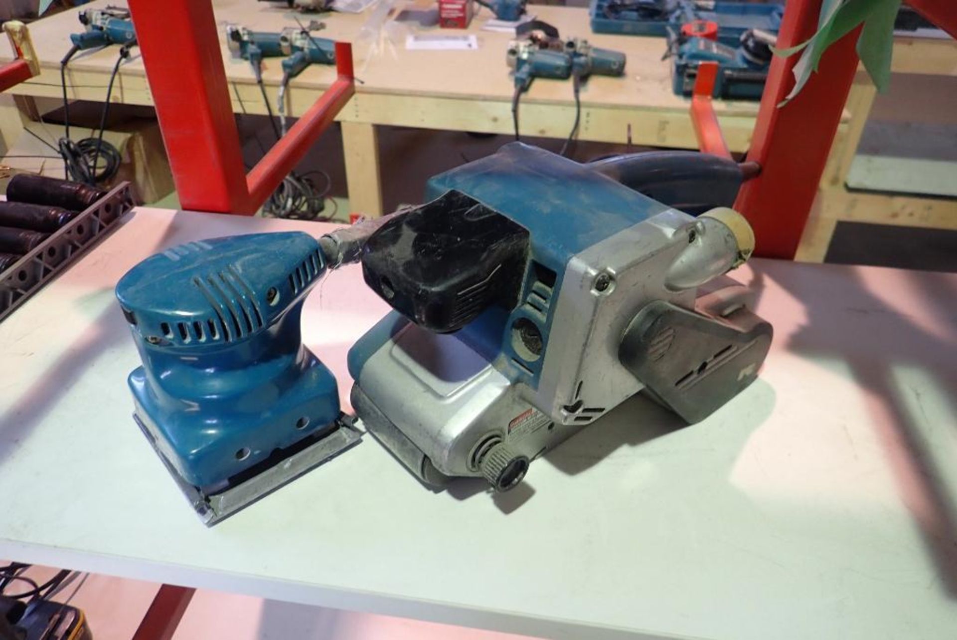 Lot of Makita Belt Sander and Palm Sander.