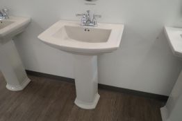 Mansfield Pedestal Sink w/ Delta Faucet.