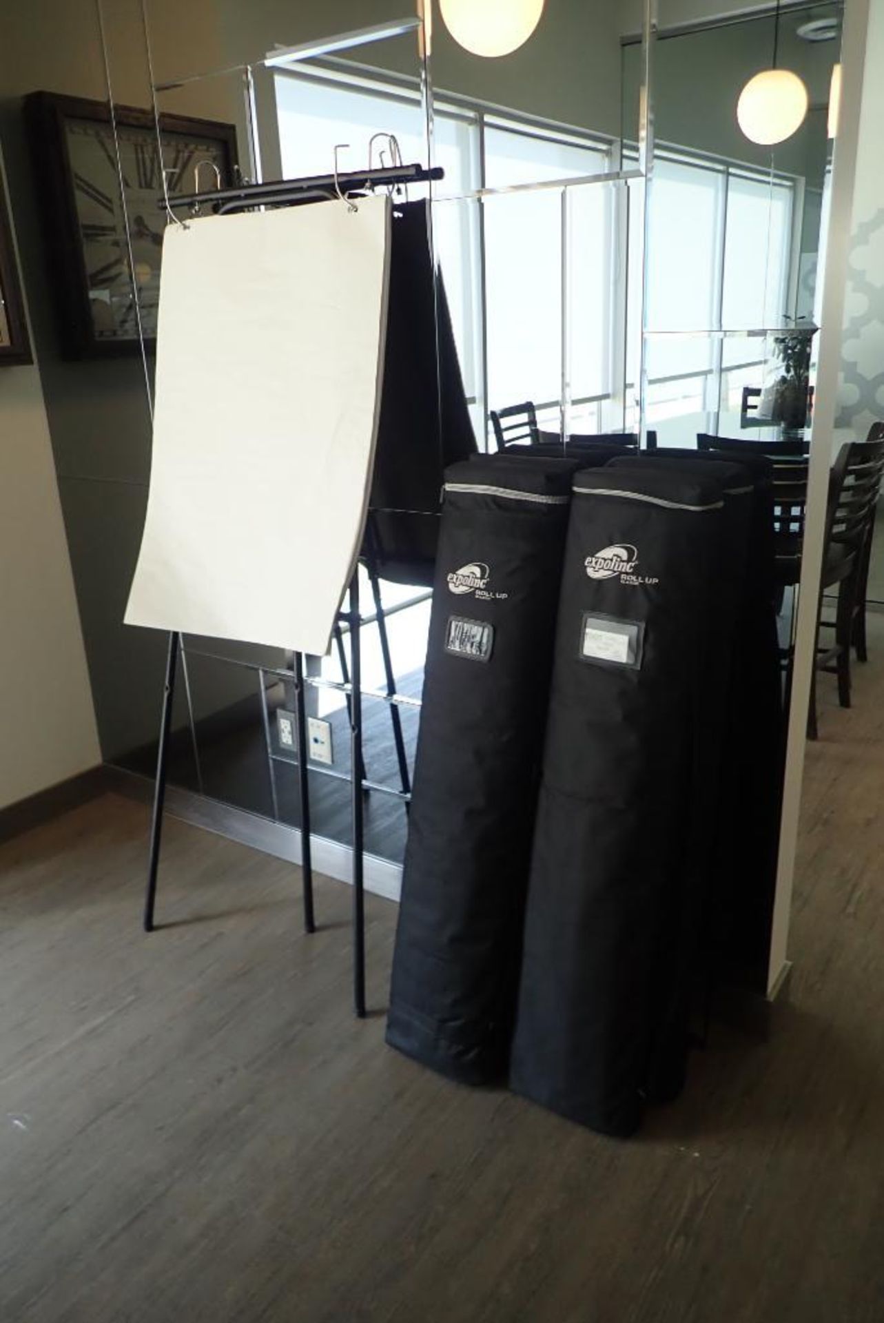 Lot of (4) Roll-up Signs and Flip Chart Easel.