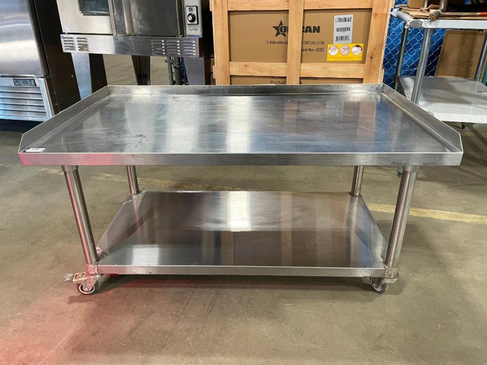 48" STAINLESS STEEL EQUIPMENT STAND ON CASTORS