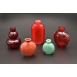 A COLLECTION OF FIVE CHINESE MONOCHROME GLASS SNUFF BOTTLES, QING DYNASTY, 18TH/19TH CENTURY