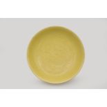 A CHINESE YELLOW-GLAZED PORCELAIN ‘DRAGON’ DISH, MARK AND PERIOD OF KANGXI, 1662 - 1722
