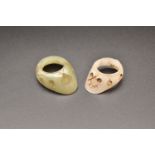 TWO MUGHAL JADE ARCHERS THUMB RINGS, 17TH/18TH CENTURY