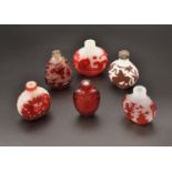 A COLLECTION OF SIX CHINESE RUBY OVERLAY GLASS SNUFF BOTTLES, QING DYNASTY, 18TH/19TH CENTURY