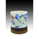 A CHINESE UNDERGLAZE-BLUE, COPPER-RED & CELADON PORCELAIN ‘LANDSCAPE’ BRUSH POT, KANGXI PERIOD