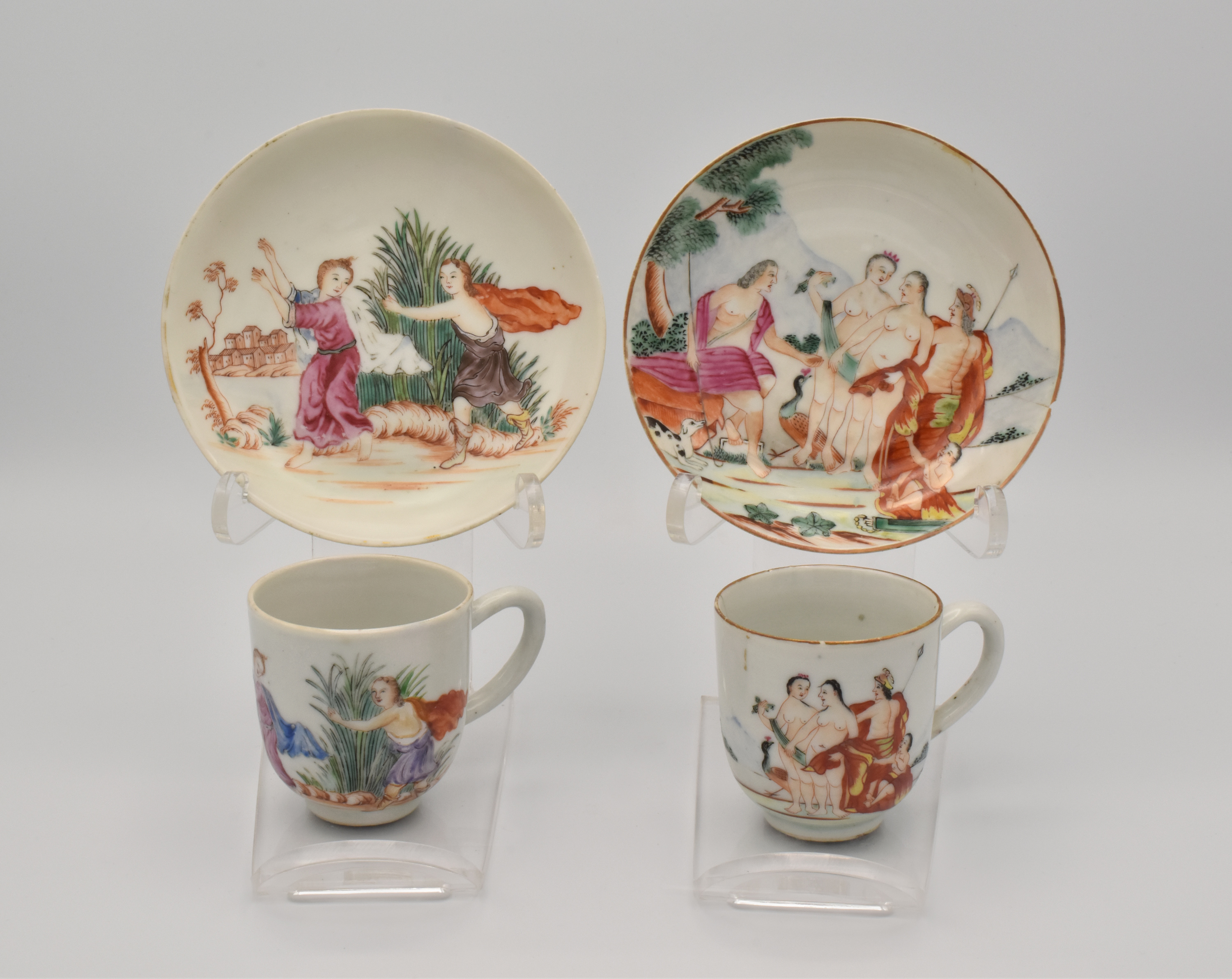 Ω TWO CHINESE EXPORT ‘FAMILLE-ROSE’ PORCELAIN ‘MYTHOLOGICAL’ SUBJECT COFFEE CUPS & SAUCERS, CIRCA 17