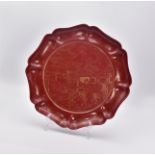 A GILT-DECORATED RED LACQUER DISH, 17TH CENTURY