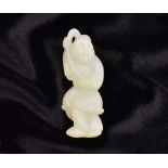 A CHINESE WHITE JADE BOY HOLDING A LOTUS, QING DYNASTY, 18TH/19TH CENTURY
