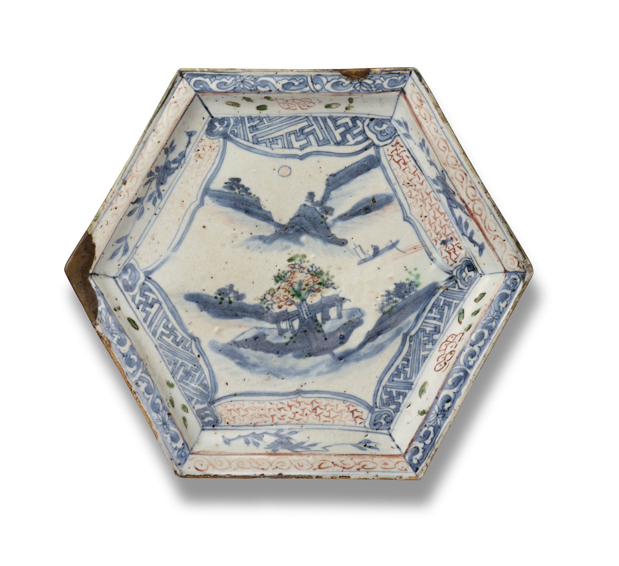 A CHINESE KOAKE HEXAGONAL SHONZUI-PATTERNED ‘RIVER LANDSCAPE’ TRIPOD STAND, TIANQI PERIOD 1621–1627