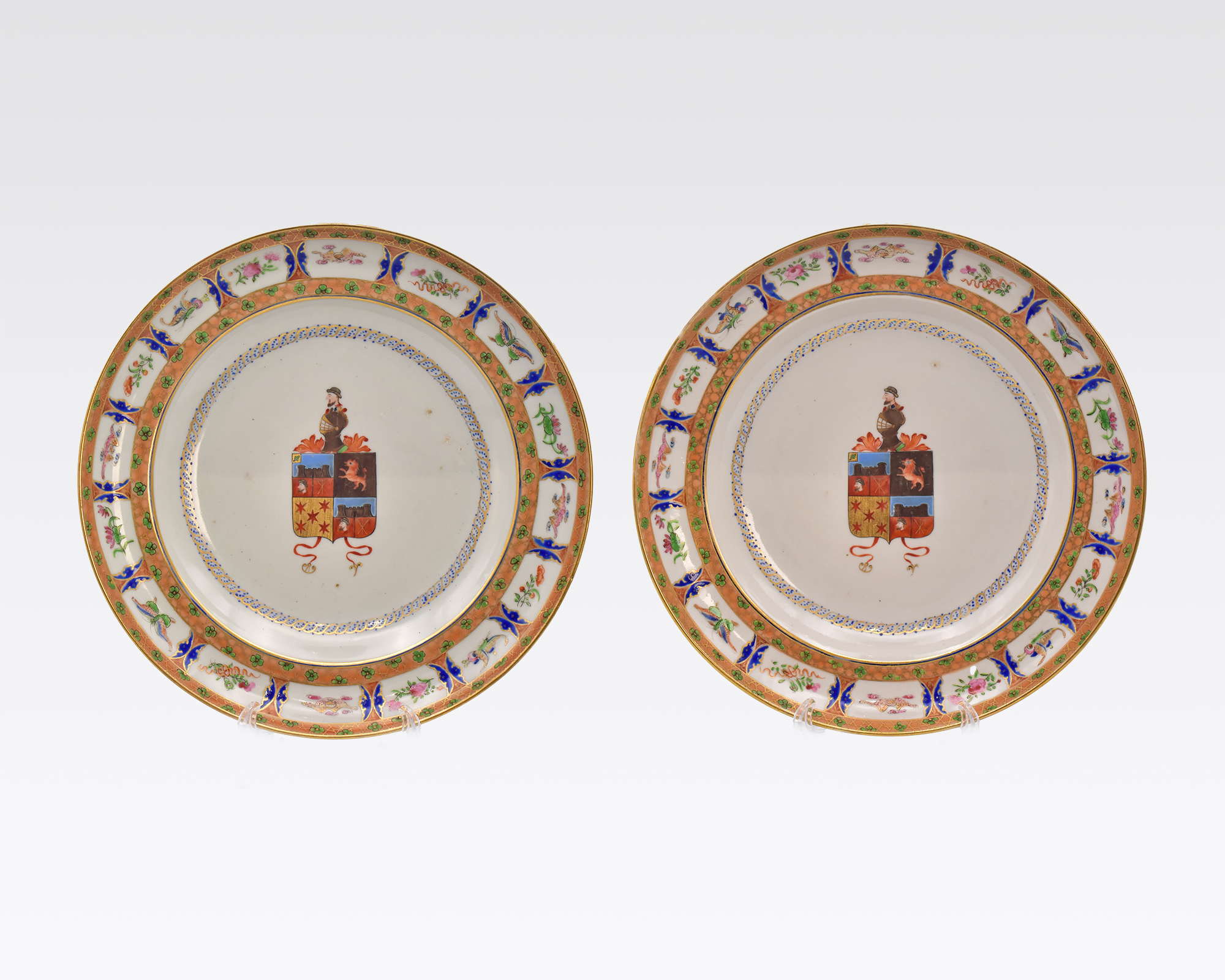 A PAIR OF CHINESE PORTUGUESE MARKET ARMORIAL DISHES, QING DYNASTY, JIAQING PERIOD, CIRCA 1820