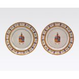 A PAIR OF CHINESE PORTUGUESE MARKET ARMORIAL DISHES, QING DYNASTY, JIAQING PERIOD, CIRCA 1820