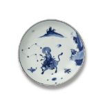 A RARE CHINESE BLUE AND WHITE PORCELAIN CIRCULAR ‘LAOZI AND OX’ DISH, TIANQI PERIOD, 1621 - 1627