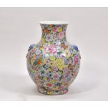 A LARGE CHINESE ‘FAMILLE-ROSE’ PORCELAIN MILLEFLEUR VASE, 20TH CENTURY
