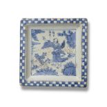 A CHINESE BLUE AND WHITE PORCELAIN SQUARE ‘IMMORTAL’ DISH, TIANQI PERIOD, 1621 - 1627