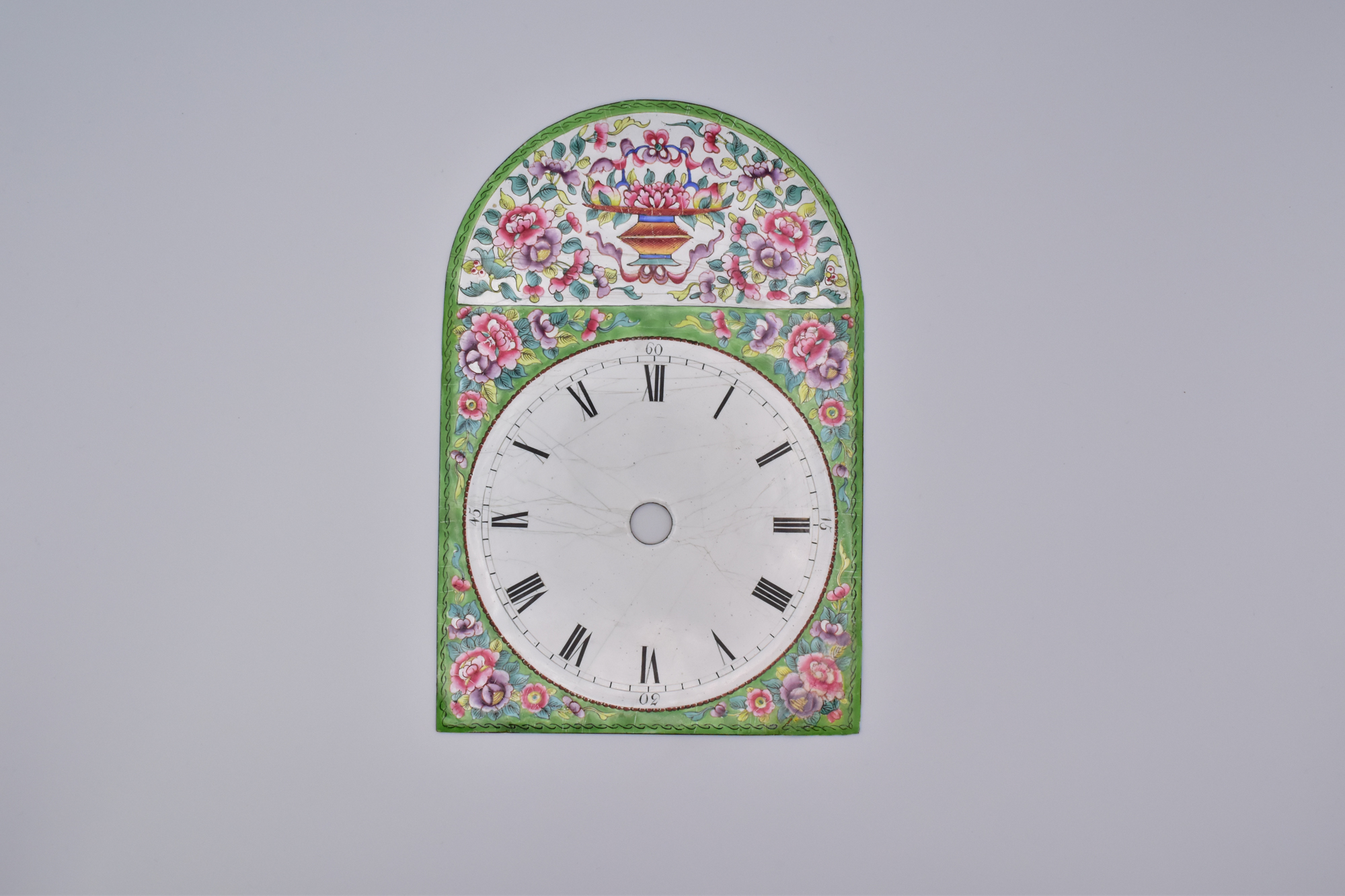 A RARE CANTON ENAMEL CLOCK FACE, QING DYNASTY, LATE 18TH/EARLY 19TH CENTURY
