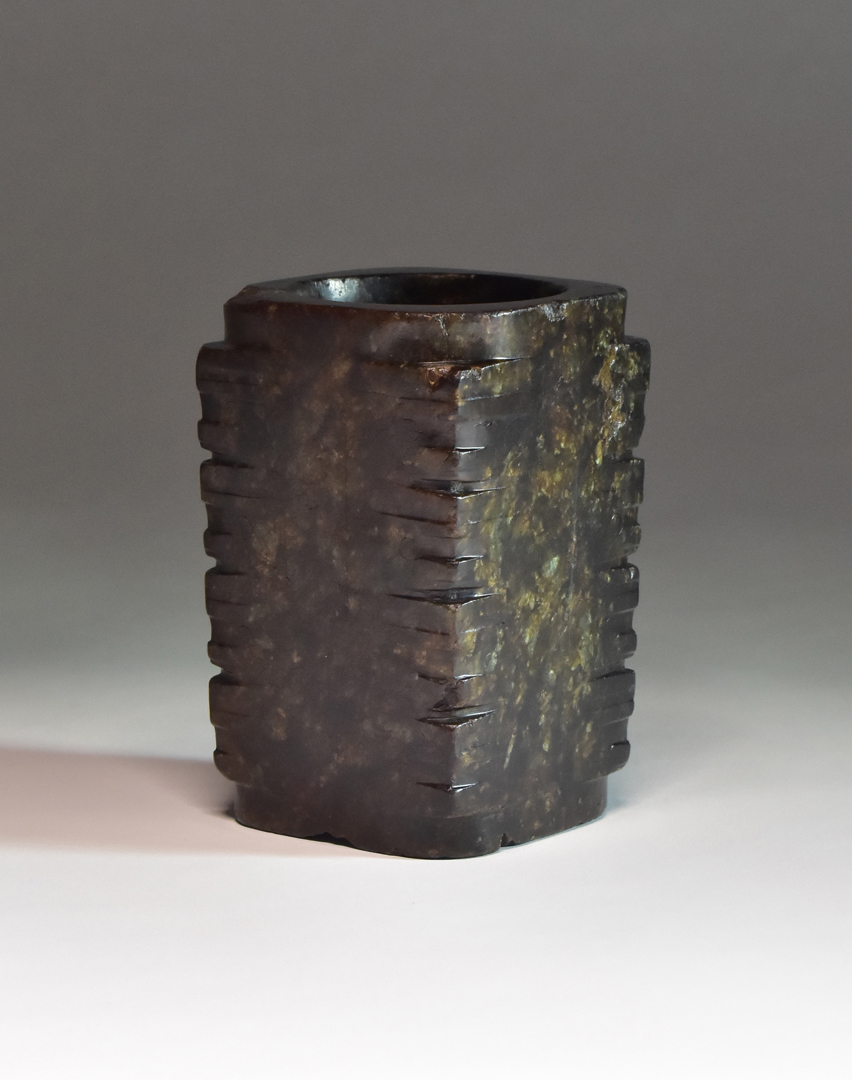 A RARE CHINESE NEOLITHIC JADE FOUR-TIERED CONG, LIANGZHU CULTURE, CIRCA 3300 - 23OO BC