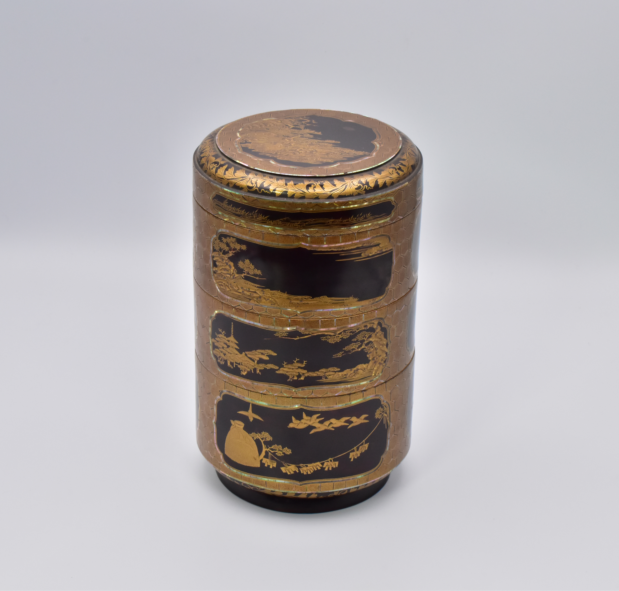 A JAPANESE LACQUER THREE-TIERED FOOD CONTAINER (JUBAKO), EDO PERIOD, 17TH CENTURY