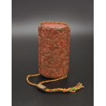 A JAPANESE CARVED RED LACQUER FIVE-TIER INRO, MEIJI PERIOD, 19TH CENTURY
