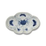 A CHINESE BLUE AND WHITE QUATREFOIL QUINCE-SHAPED TRIPOD SERVING DISH, TIANQI PERIOD, 1621 – 1627