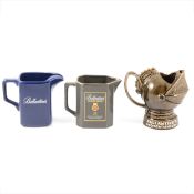 Collection of Ballantine's branded ceramic water jugs and glassware