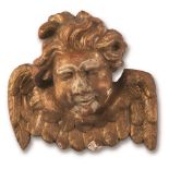 Scultura in legno dorato raffigurante volto di cherubino