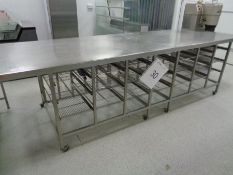 Approx 4m x 1.2m Stainless Steel preparation table with under counter tray storage