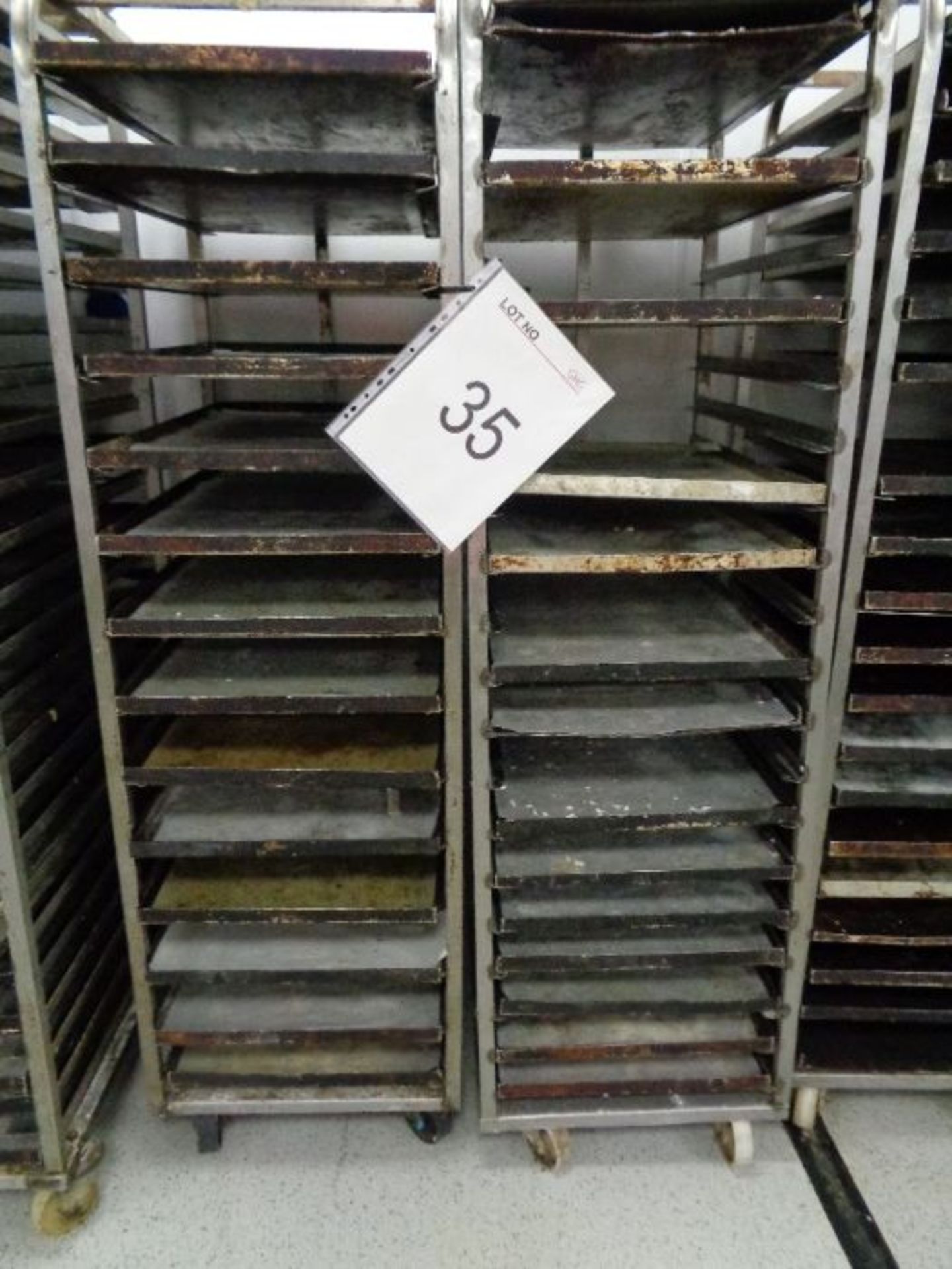 2 X 20 tier bakery racks with trays as lotted