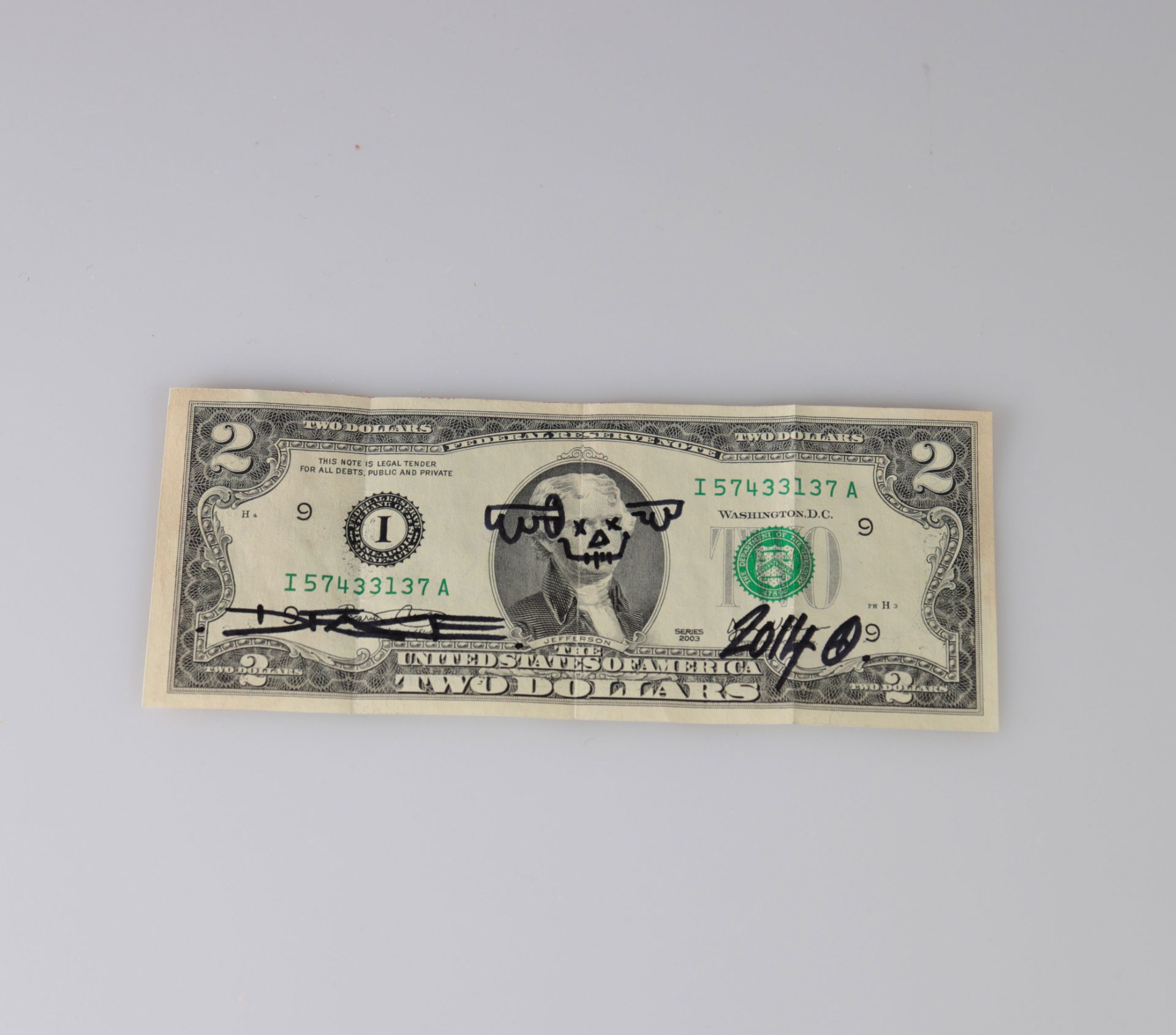 D * Face - 2 Dollar Bill, 2014 Black black on a US dollar bill. Hand signed by the artist