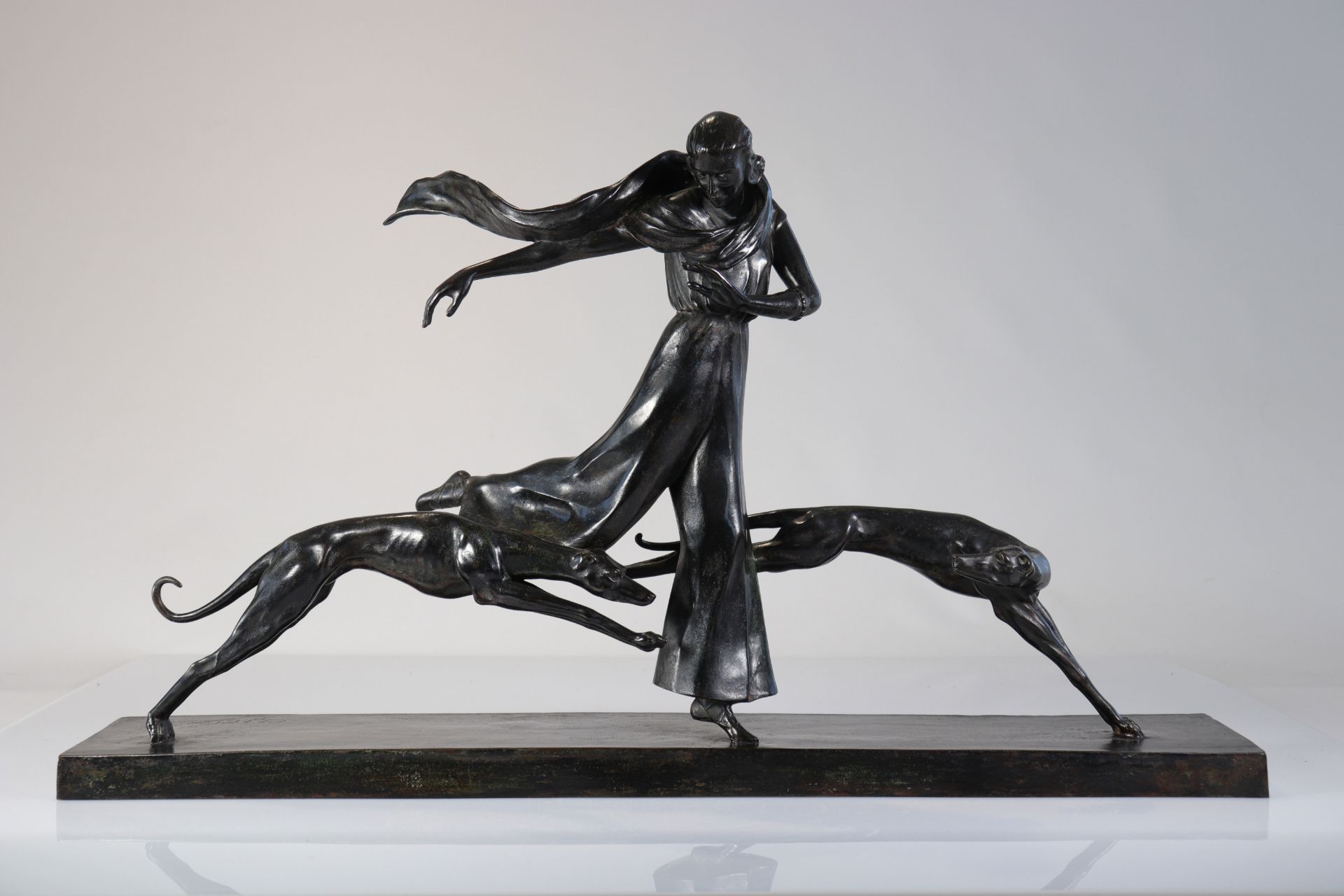 Claire COLINET (1880-1950) Rare and imposing bronze "young woman with greyhounds"